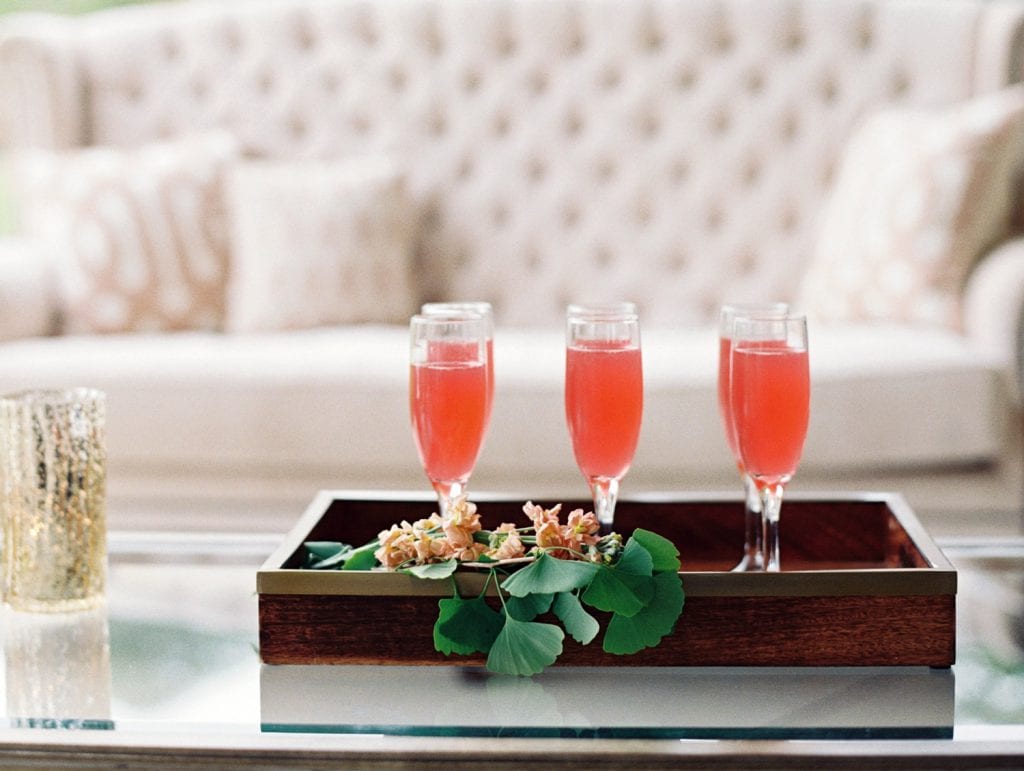 Red cocktails on glass table