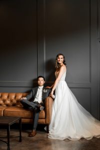 Bride and groom sharing drinks at a north Georgia wedding venue bar.