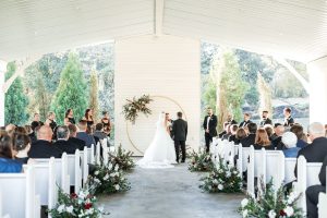 Bride and Groom exchange vows in chapel